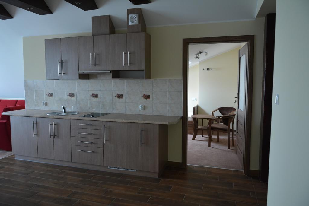 Hotel Gosciniec Pan Tadeusz II à Giżycko Chambre photo